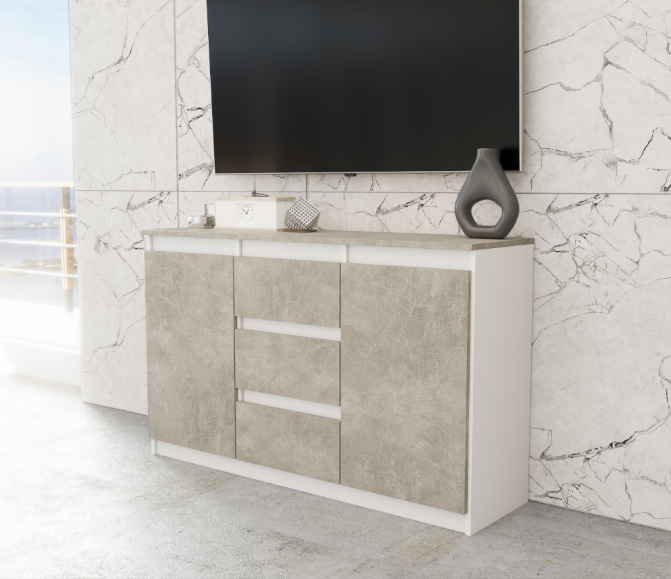 Komoda Agnes 120cm z 2 drzwiami i 3 szufladami na tle rzeczywistym z korpusem w kolorze bialy mat oraz frontami i blatem w kolorze beton