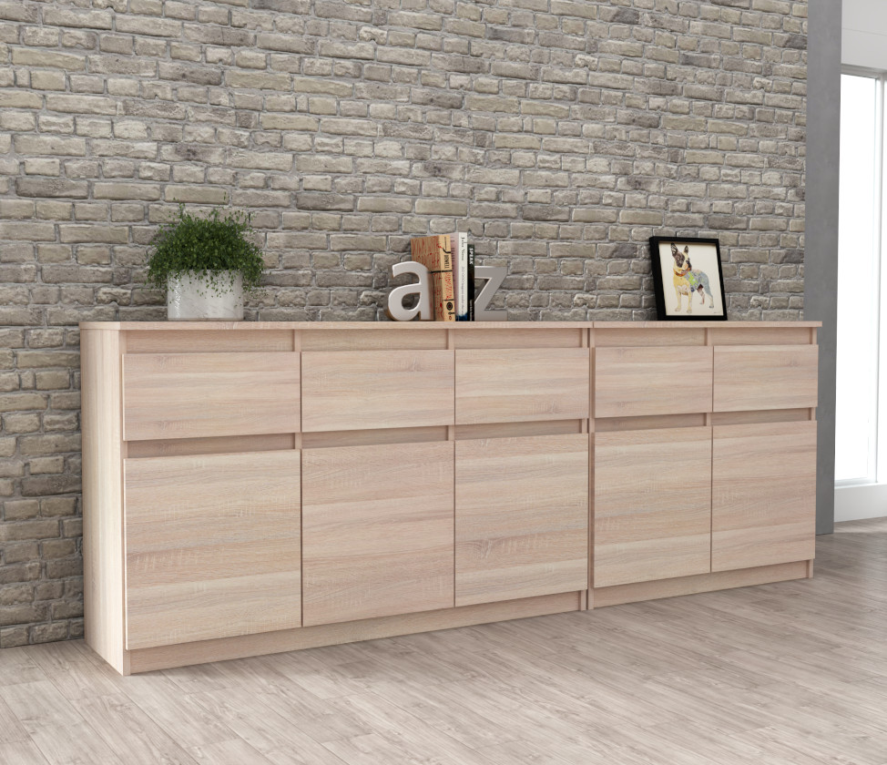 Komoda Best Oleksa 200cm z 6 drzwiami i 6 szufladami na realizacji w kolorze bialym z korpusem w kolorze dab sonoma i frontami w kolorze dab sonoma